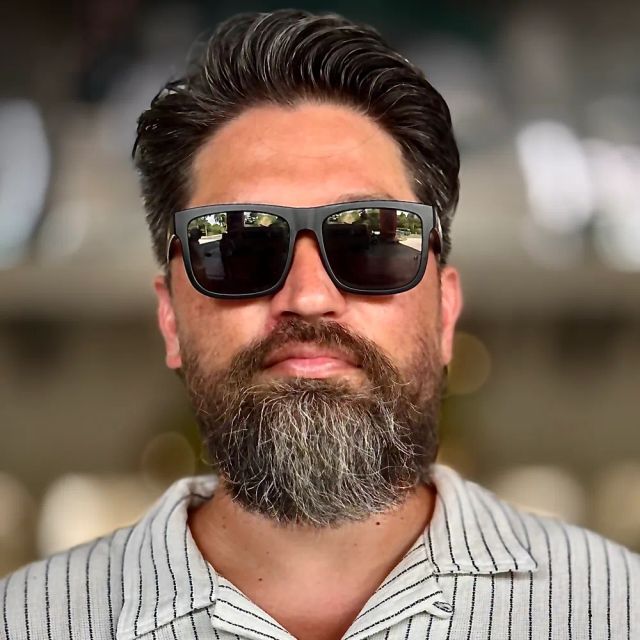 Shifter wearing sunglasses, as photographed by his son.